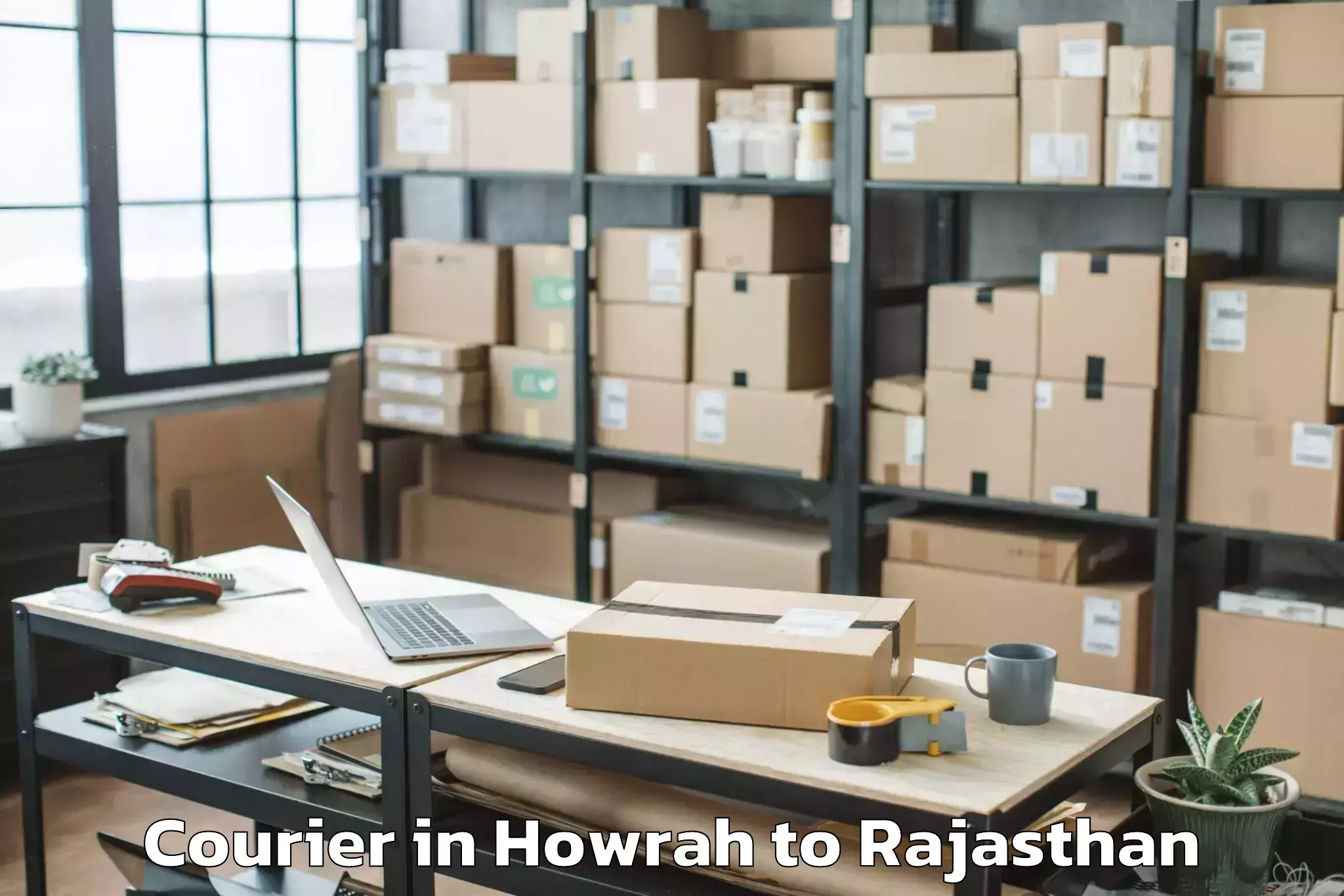 Professional Howrah to Madanganj Kishangarh Courier